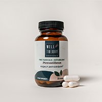 Brown glass bottle labeled "Well Theory Pterostilbene" with three white capsules on a plain background.