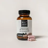 A brown bottle labeled "Tart Cherry Extract Anti-Inflammatory" with three pink capsules for natural pain relief.