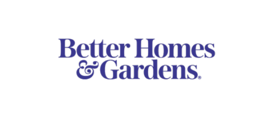 Better Homes & Gardens logo in bold blue serif font on a transparent background.
