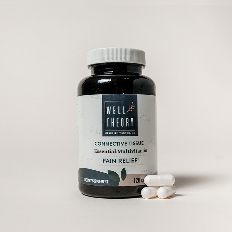Well Theory Connective Tissue Essential Multivitamin bottle with three white capsules on a plain surface.
