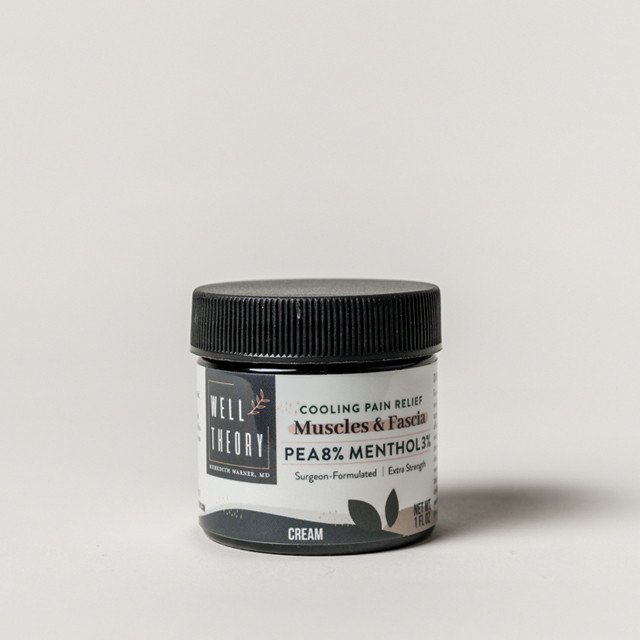 A small jar of Well Theory cooling pain relief cream with PEA 8% and menthol 3% for muscles and fascia.